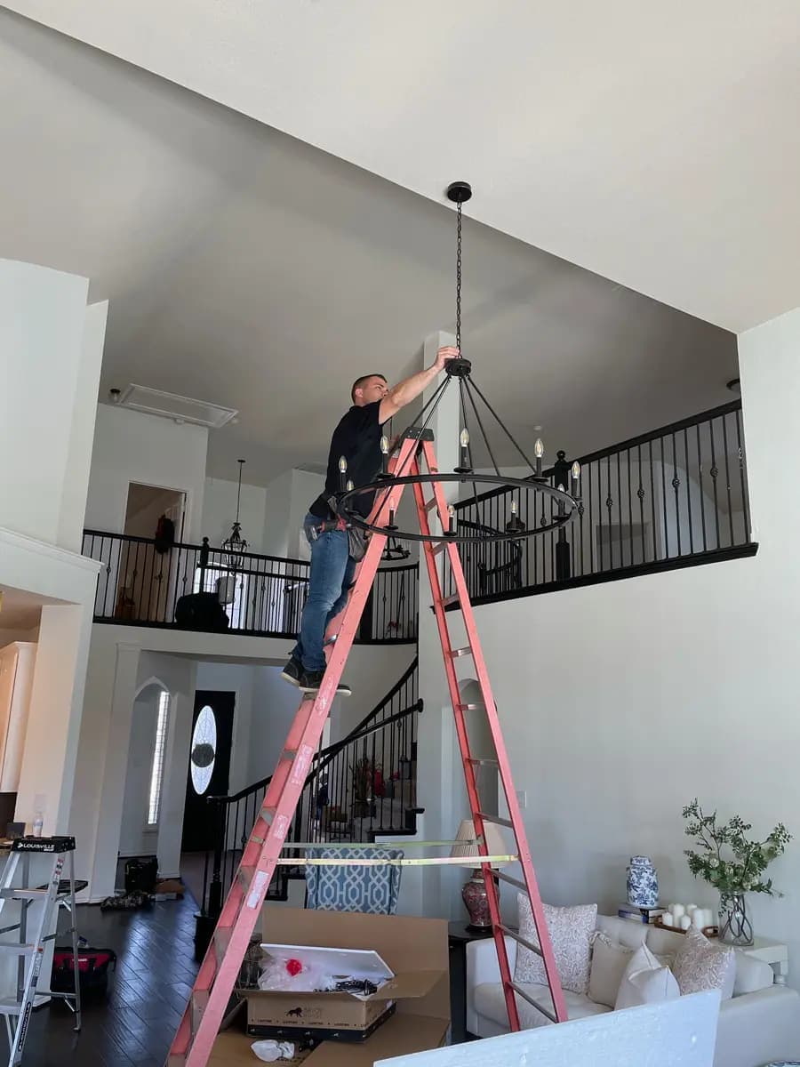 Entryway chandelier installation in North Texas
