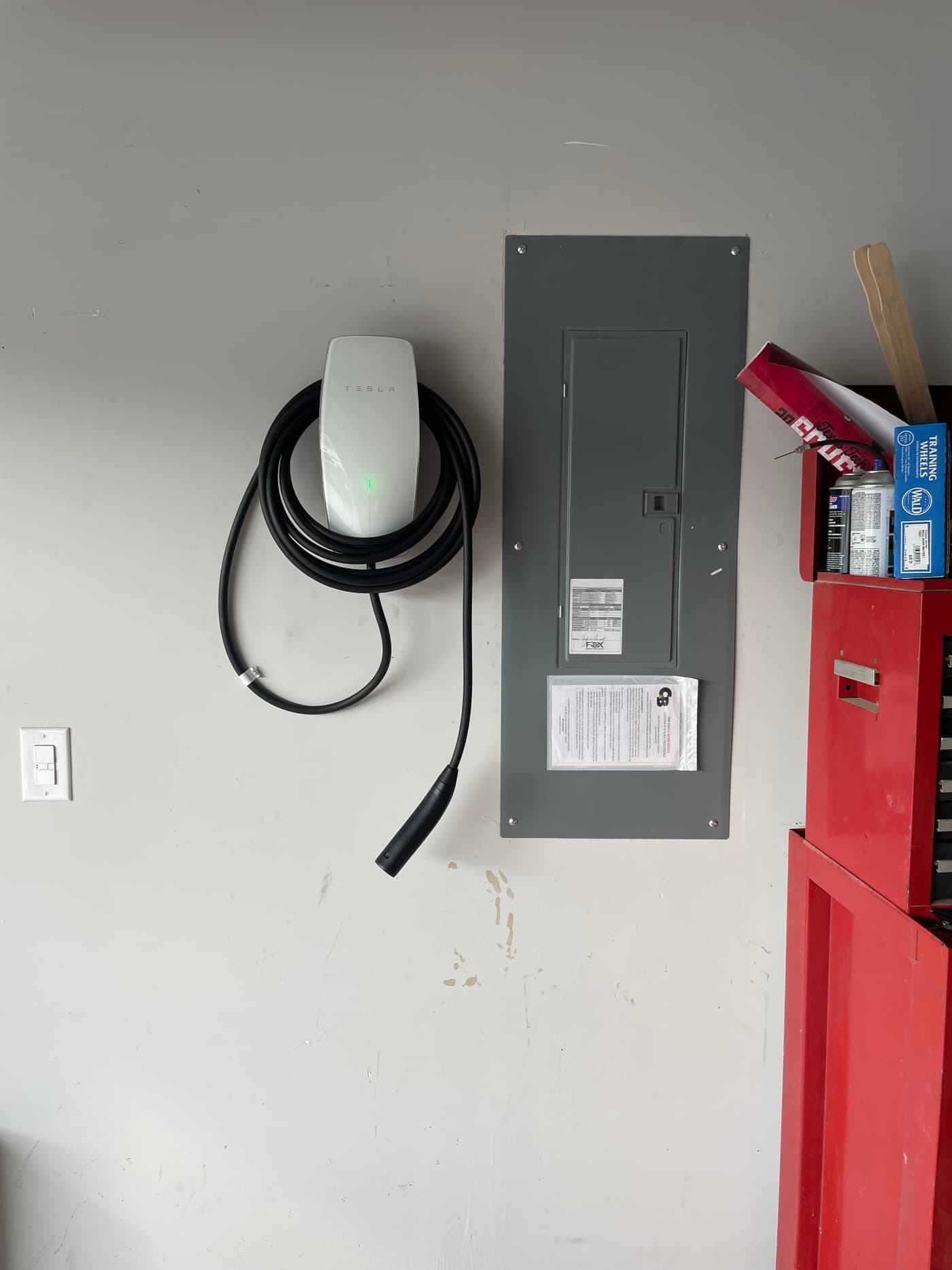Tesla Wall Connector installed in a garage in North Texas