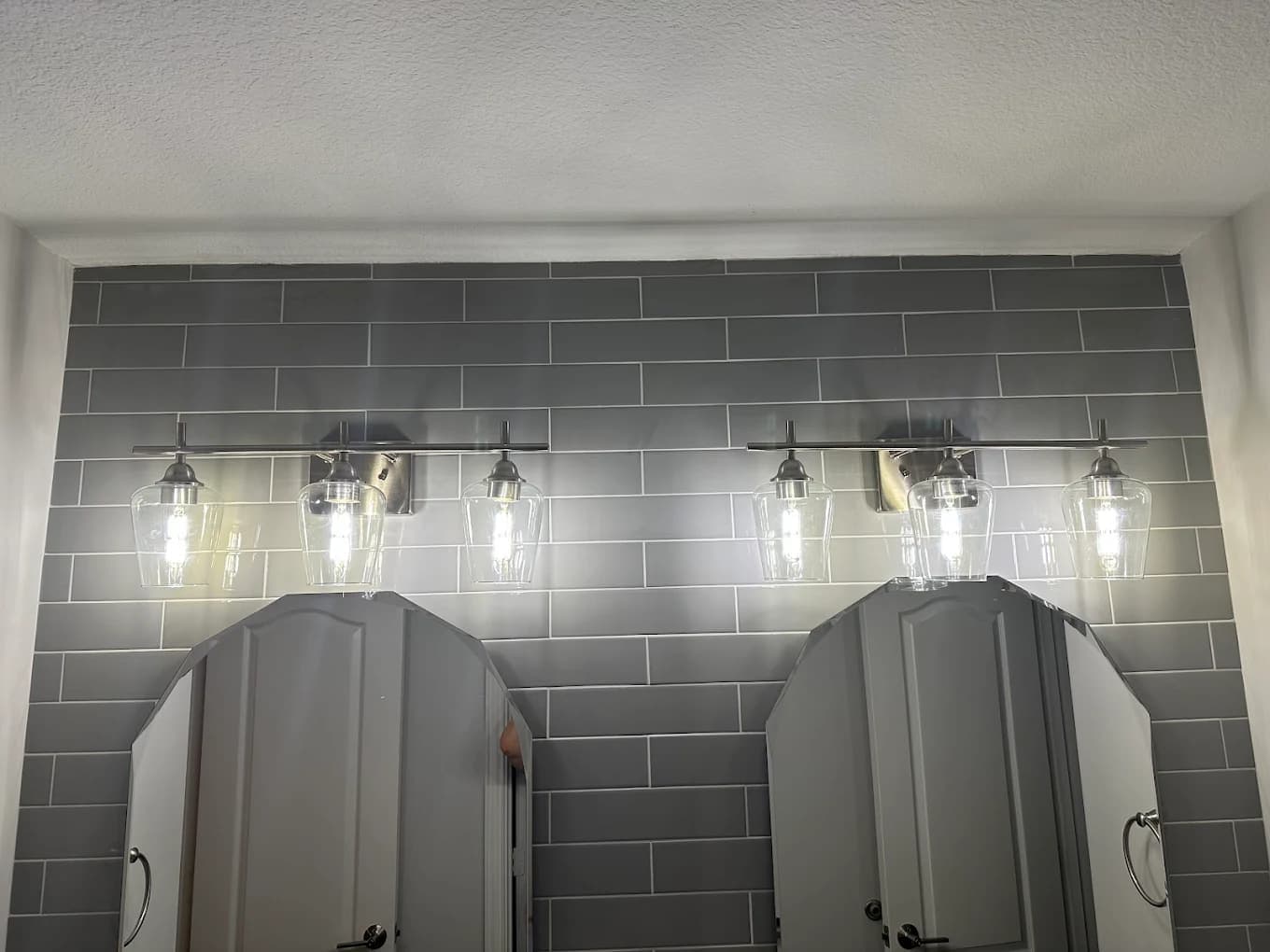 Bathroom vanity lighting installation in North Texas